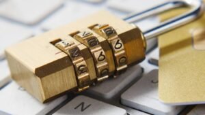 digitisation padlock on top of laptop keyboard