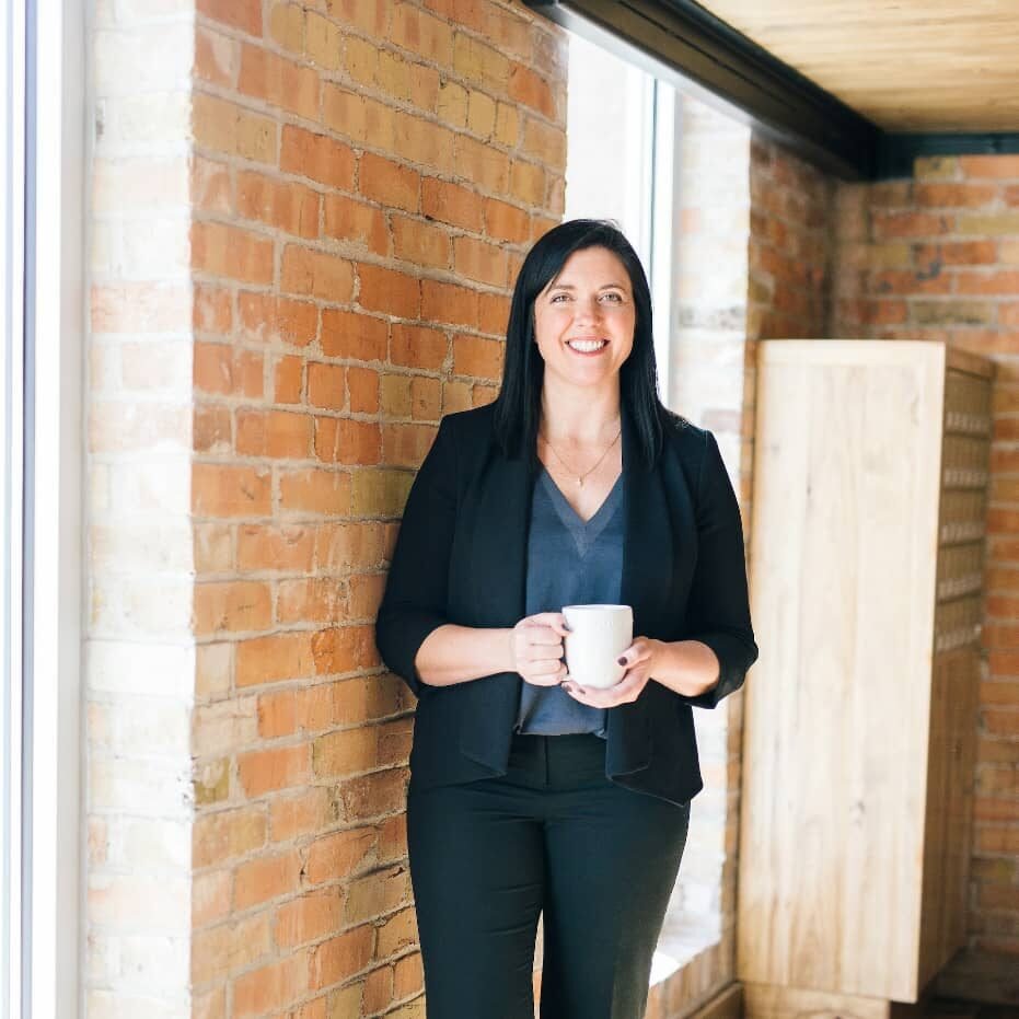 lady smiling holding coffee